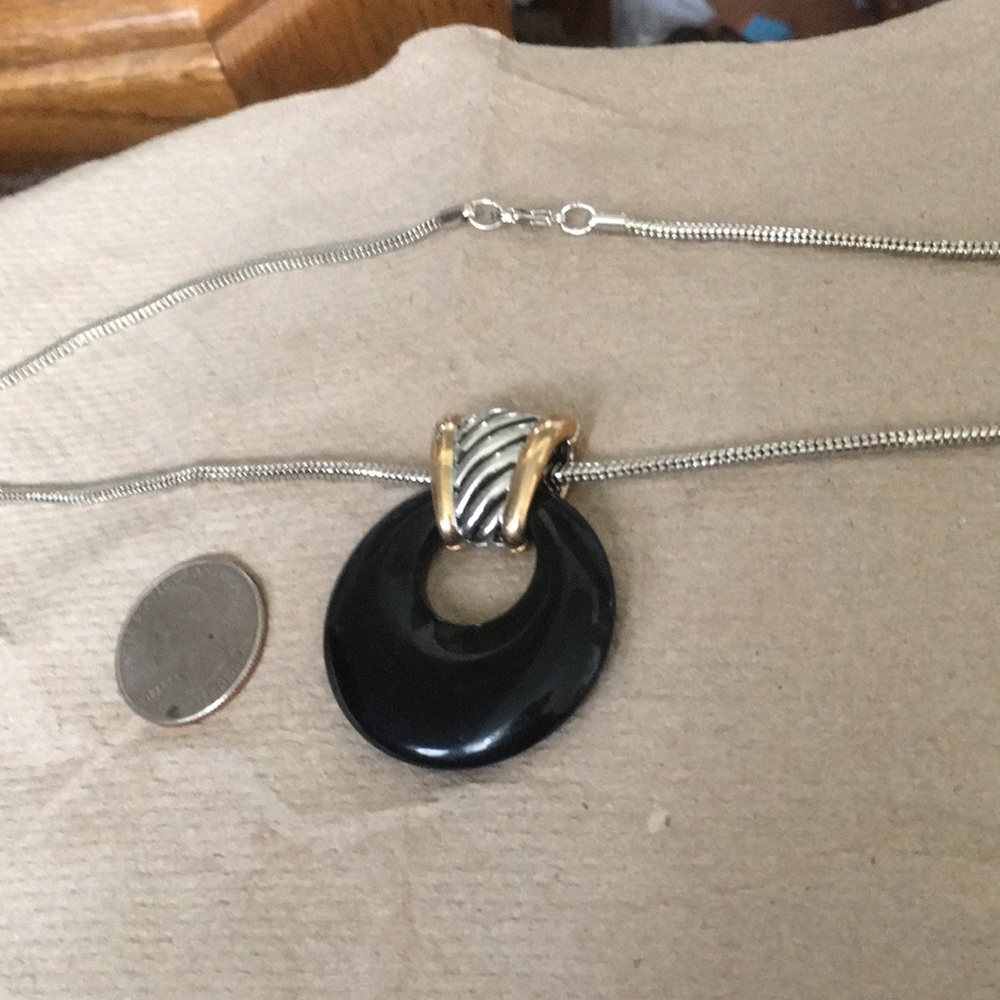 Silvertone snake chain with pendant